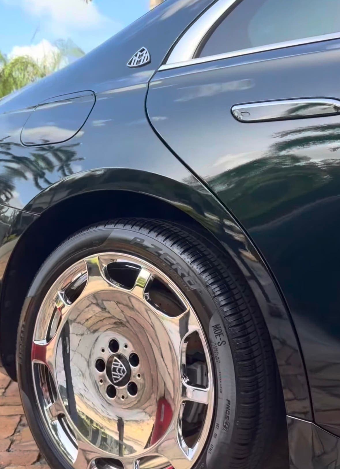 Maybach chrome wheel and deep green paint, freshly detailed
